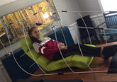 OXYFLOW MINI hyperbaric chamber in blue, showcasing design and pressure valves for oxygen therapy.